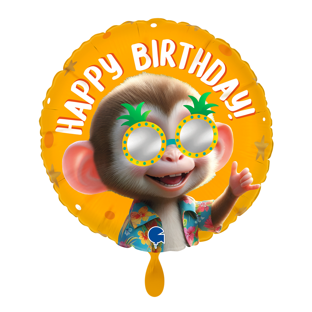 Runder Folienballon mit orangem Hintergrund, Affe im Hawaiihemd und Ananas-Sonnenbrille, Aufschrift „Happy Birthday“.