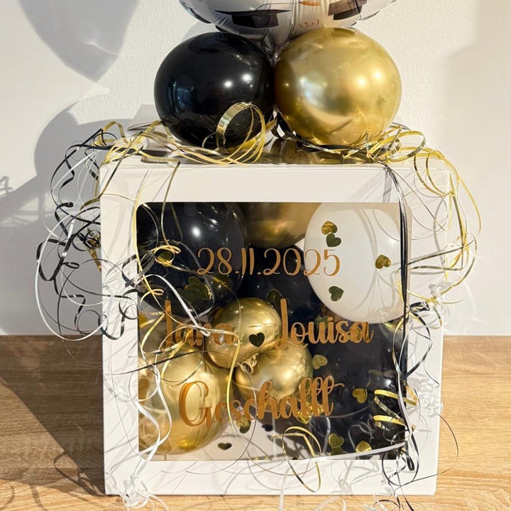 Personalisierte Ballonbox zur bestandenen Prüfung in Schwarz Gold mit YES Bestanden Ballon und Name
