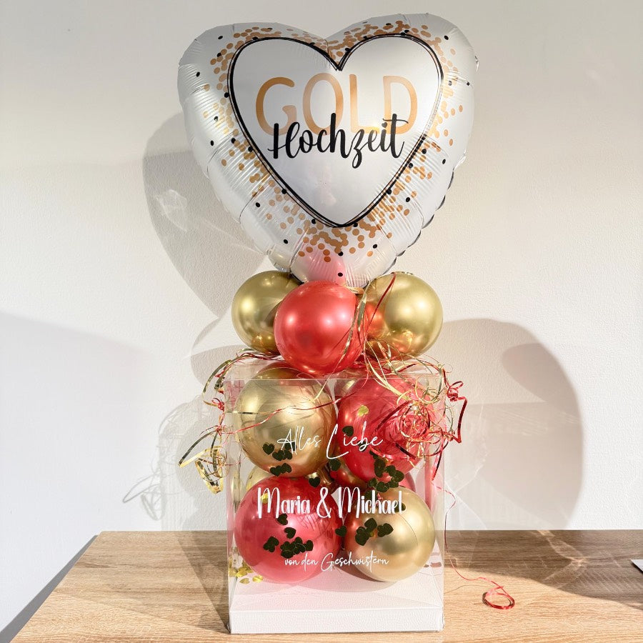 Ballonbox zur Goldhochzeit in Rot und Gold mit personalisiertem Namen und Herz-Highlightballon „Gold Hochzeit