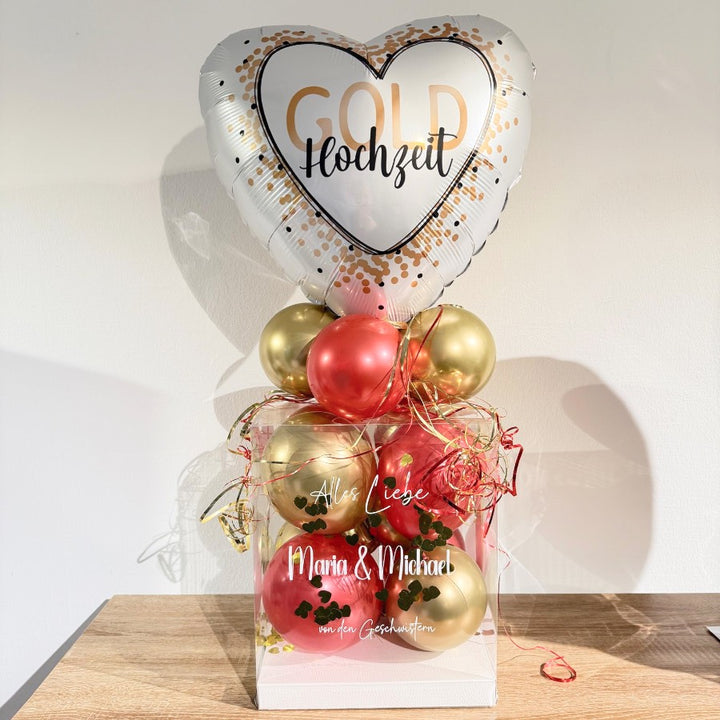 Ballonbox zur Goldhochzeit in Rot und Gold mit personalisiertem Namen und Herz-Highlightballon „Gold Hochzeit