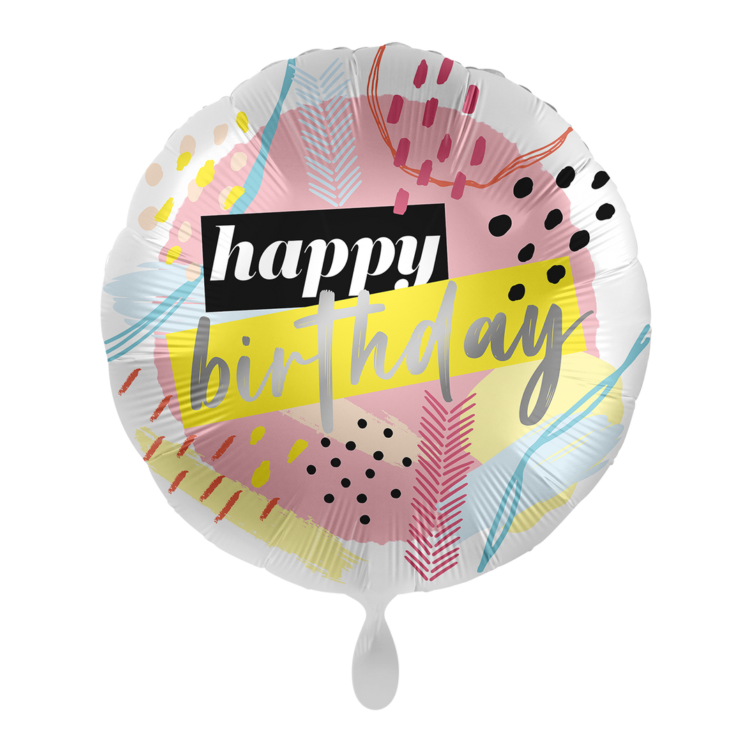 Runder Geburtstagsballon mit moderner Retro-Optik, bunten Pastellfarben, Blättermotiven und der Aufschrift „Happy Birthday“.