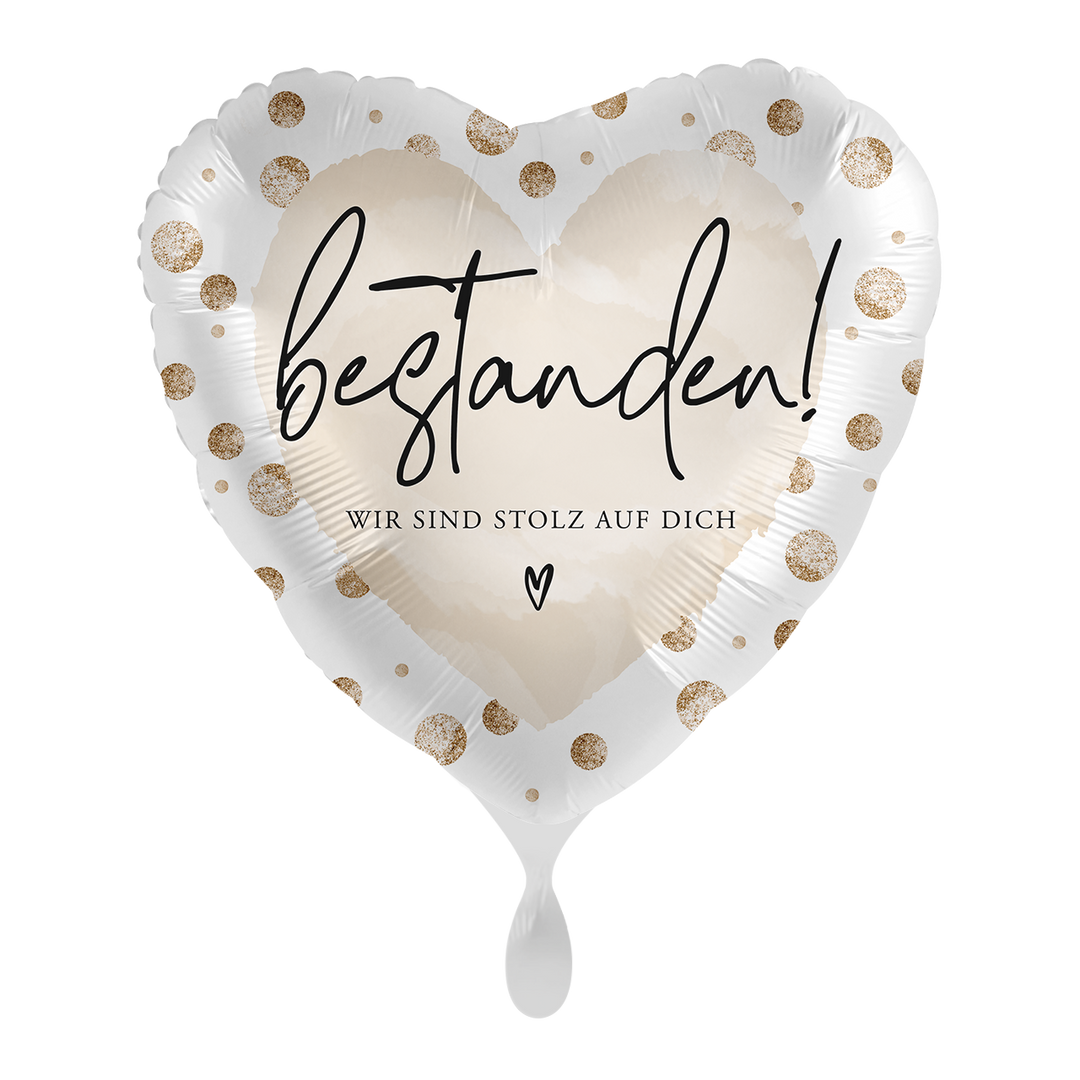 Herzförmiger Folienballon in Weiß-Gold mit Punkten und der Aufschrift „Bestanden! Wir sind stolz auf dich“