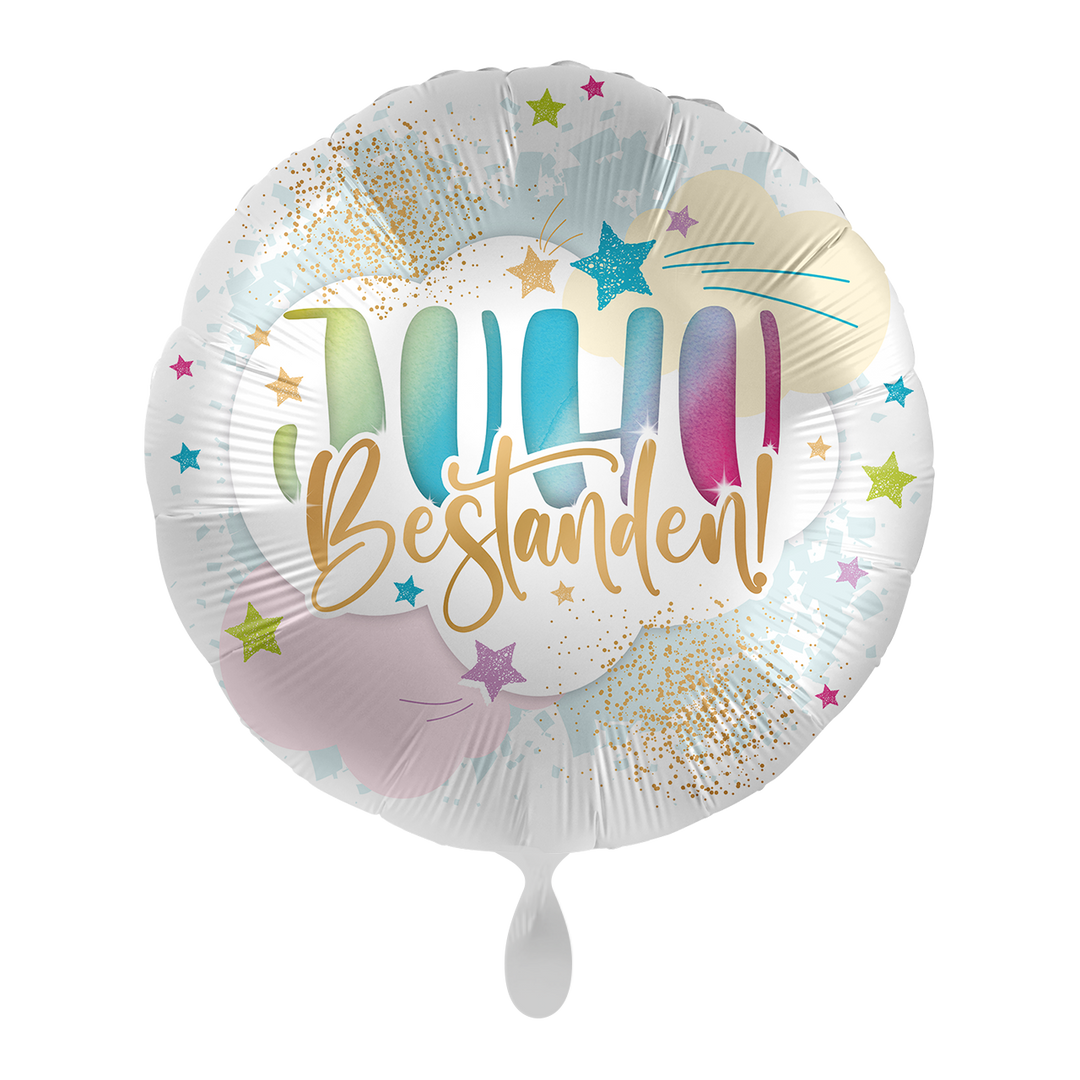 Runder Folienballon in Weiß mit buntem Farbverlauf, goldenen Details, Sternen und der Aufschrift „Juhu Bestanden!“.
