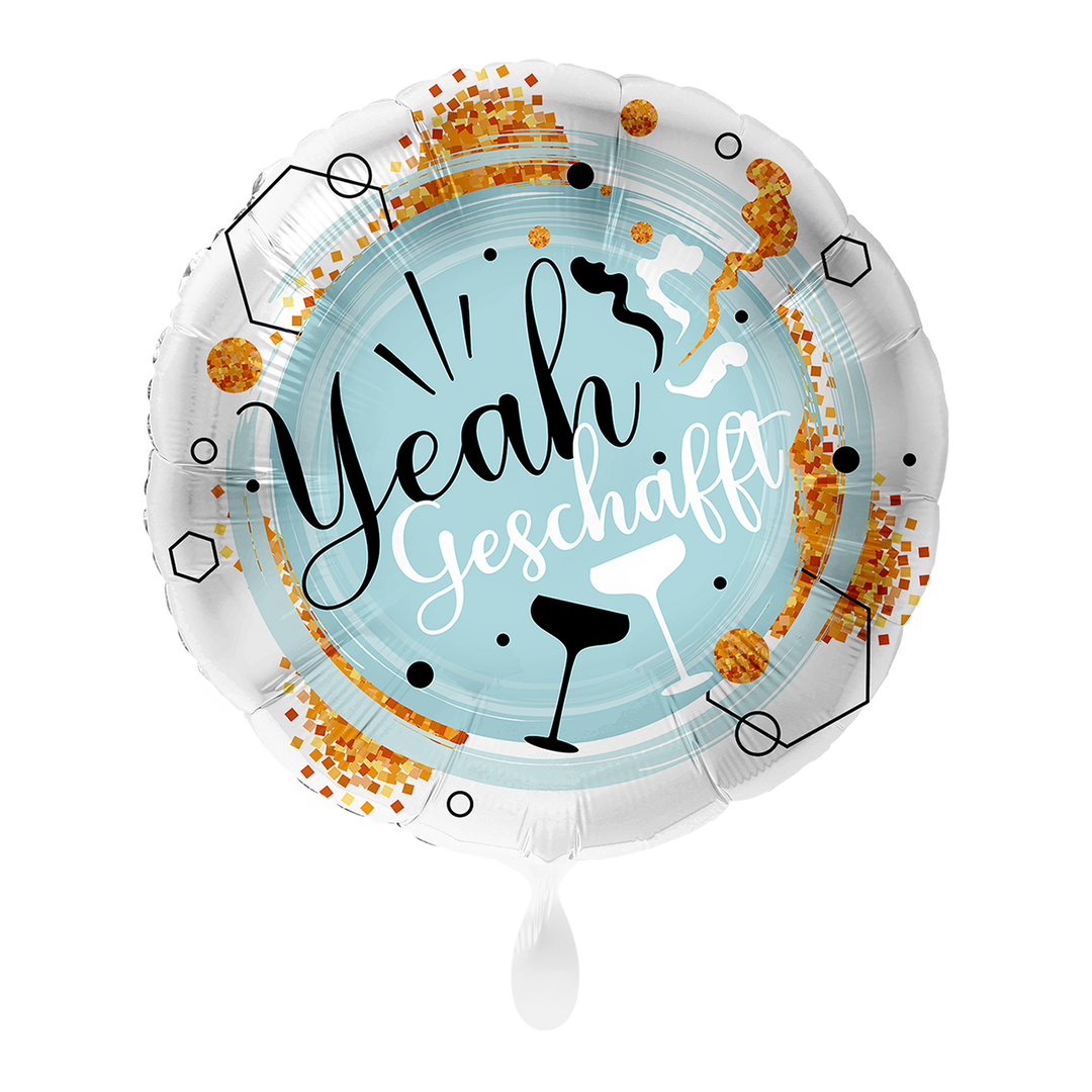Runder Folienballon in Hellblau mit goldenen Details, Cocktailglas und der Aufschrift „Yeah Geschafft!“.
